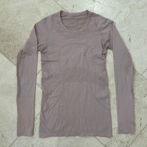 lululemon swiftly long sleeve hip length. dusty pink color. size 6. EUC